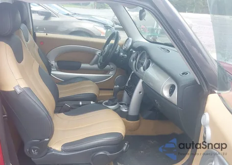 2004 Mini Cooper z USA, uszkodzony, nr VIN WMWRC33404TJ58399